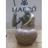 BOXED LLADRO GLAZED AND UNGLAZED CERAMIC FIGURE - AFRICAN MAN (AT FAULT)