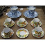 SET OF SIX SPANISH FLORAL DECORATED COFFEE CUPS AND SAUCERS (ONE CUP DEFICIENT),