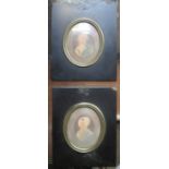 PAIR OF OVAL MINIATURE PORTRAITS WITHIN EBONISED FRAME