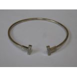 TIFFANY & CO 18ct (750) WHITE GOLD BANGLE SET WITH EIGHTEEN SMALL DIAMONDS ON OPPOSING T FORM