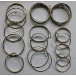 LARGE QUANTITY OF SILVER AND SILVER COLOURED BANGLES