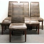 A set of four crocodile skin pattern leather upholstered dining chairs and matching stool.