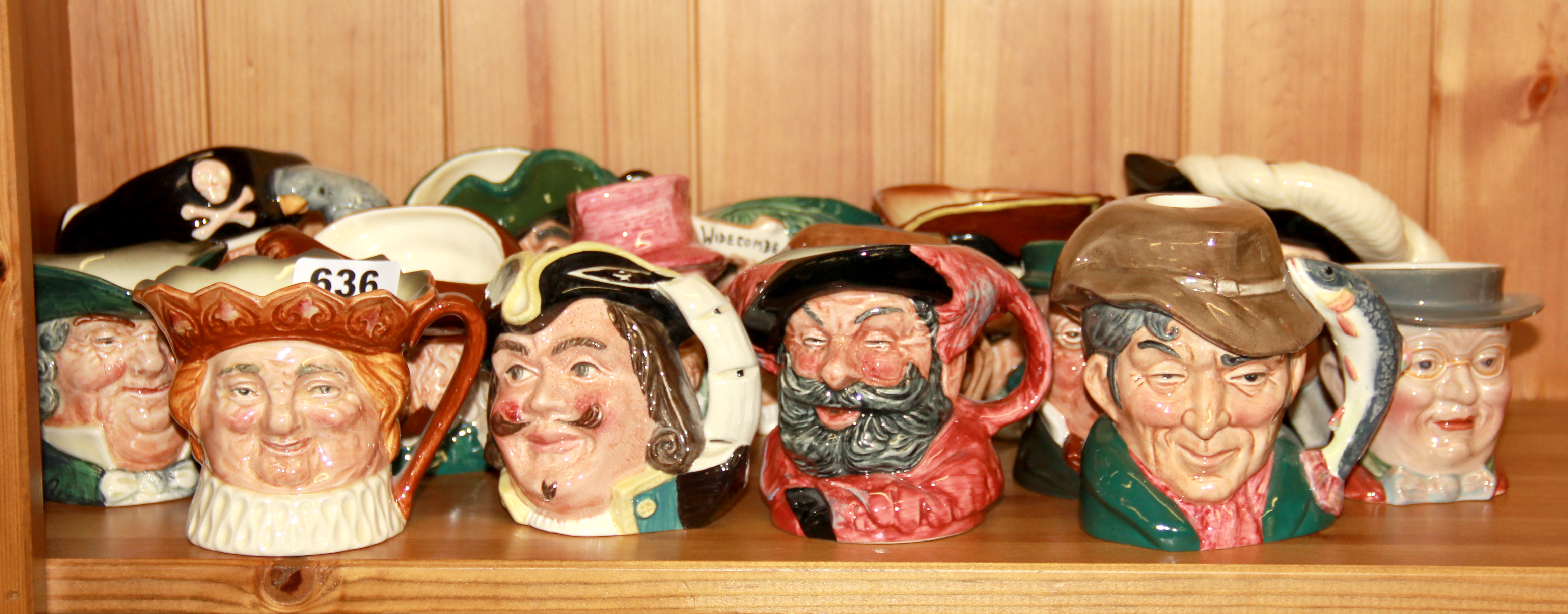 A quantity of Royal Doulton and other character jugs, H. 10cm.