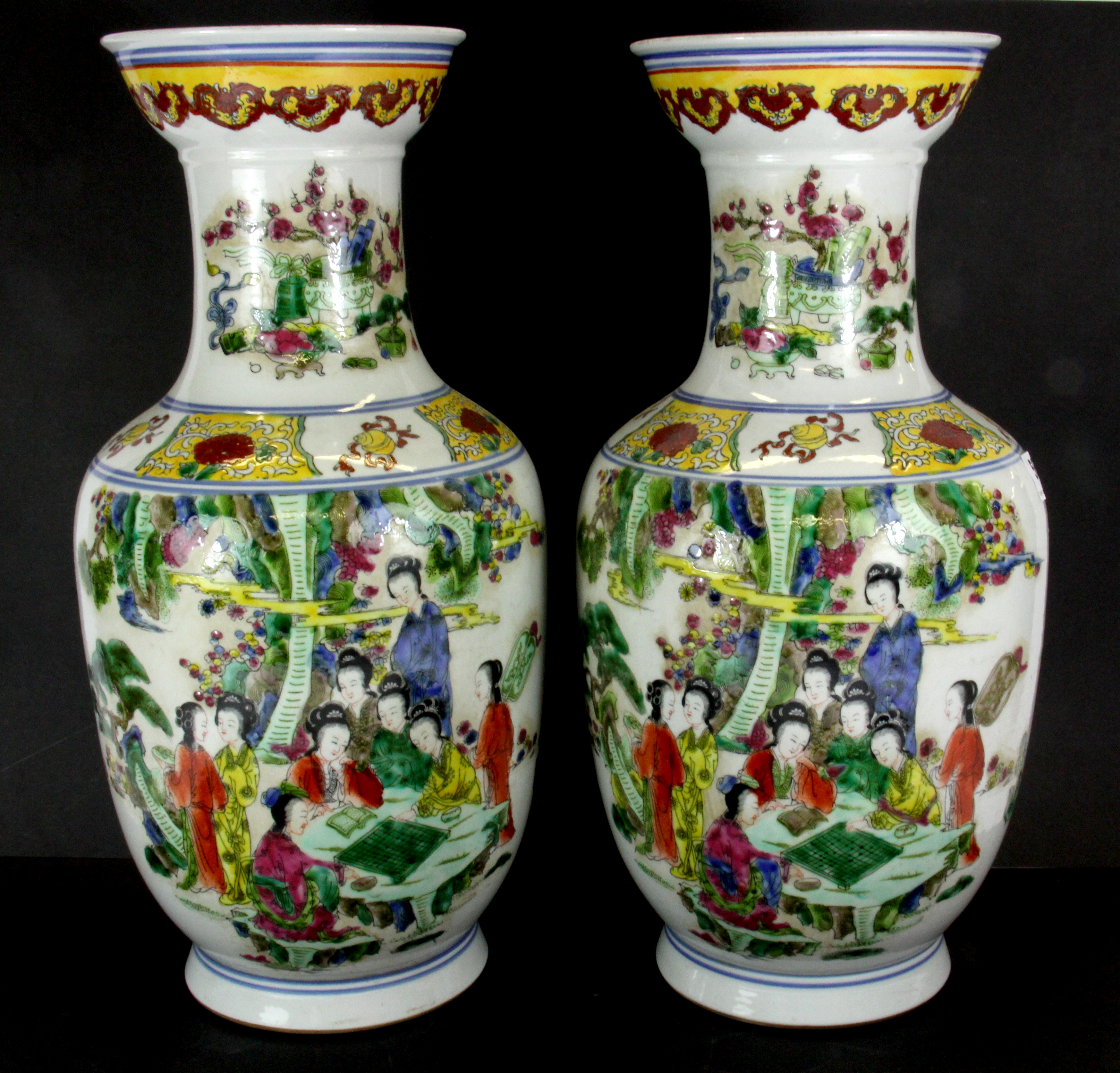 A pair of early/ mid-20th Century Chinese hand enamelled porcelain vases, H. 41cm.