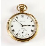 A 9ct yellow gold open face pocket watch with an engraved detail at the back.