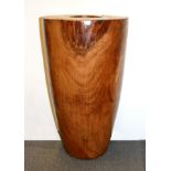 A large Indonesian hardwood vase, H. 66cm.