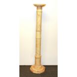 A 1920's alabaster pedestal, H. 100cm.