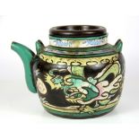 A 1920's Chinese enamelled terracotta tea pot, H. 14cm.