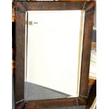 An Arts & Crafts copper finished wall mirror, 48 x 70cm.