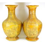 A superb pair of large Chinese relief decorated hexagonal porcelain vases, with impressed six