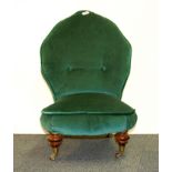 A small upholstered child's chair.