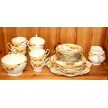 An Art Deco Cabochon bone china tea set.