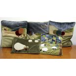 A set of five vintage handmade applique cushions, largest 45 x 45cm.