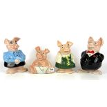 Four Wade pig money boxes.