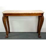 A lovely marble topped carved mahogany hall table with lions paw feet, 131 x 49 x 88cm.