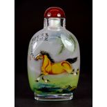 A signed Chinese inside painted snuff bottle of horses with a cornelian stopper, H. 9cm.
