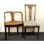 A cane seated 19th Century French arm chair and an Art Nouveau bedroom chair.