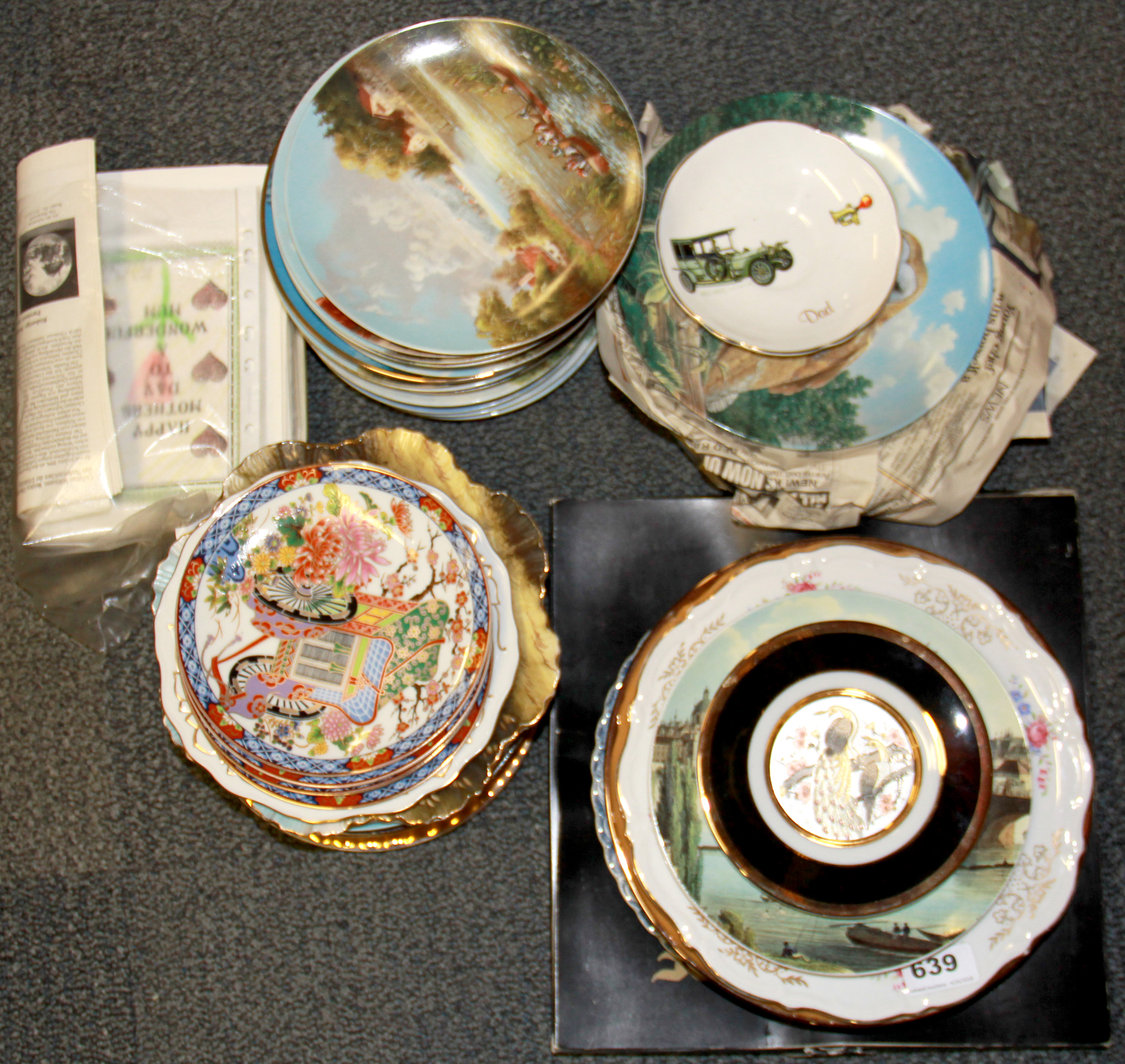 A large quantity of collector's plates, many with certificates.