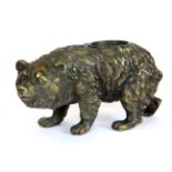 A bronze bear match holder, L. 21cm.