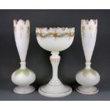 A 19th Century gilt decorated white opaline glass garniture, H. 34cm.