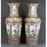 A pair of early-mid 20th Century impressive large Chinese gilt porcelain hexagonal vases, H. 56cm.