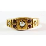 A gentleman's 15ct gold ruby and pearl set ring, (N.5).