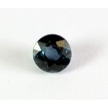 An unmounted 0.68ct round cut natural untreated sapphire.