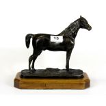 A bronze figure of a horse on a wooden base after Mene, H. 22cm base W. 24cm.