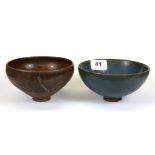 Two Chinese pottery bowls (both repaired), Dia. 14cm.