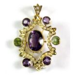 Suffragette interest. An Edwardian 9ct yellow gold pendant set with amethyst, peridot and pearls, L.