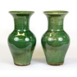 A pair of 19th Century Chinese green glazed porcelain vases (one with small repair to rim), H.