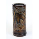 A finely carved Chinese bamboo dice shaker / brush pot, H. 12cm.