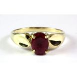 A 9ct yellow gold ruby set ring, (N.5).