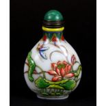 A Chinese mid-20th Century enamelled and relief decorated milk glass snuff bottle, H. 7.5cm.