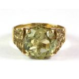 A 9ct yellow gold citrine set ring, (K).