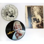 Marilyn Monroe interest. A Marilyn Monroe picture disk clock and two others.