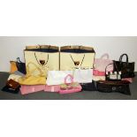 Nine good quality handbags and one purse.