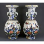 A pair of Chinese early-mid 20th Century hand painted porcelain vases decorated with phoenix, H.