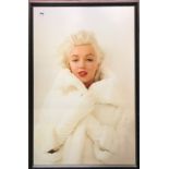 A large framed print of Marilyn Monroe, 67 x 97cm.