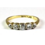 An 18ct yellow gold and platinum 5 diamond set ring, (L).