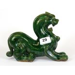 A Chinese green glazed marbled pottery figure of a dragon (with small repair to ear), H. 17cm.