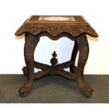 A Burmese carved hardwood table, 57 x 57 x 57cm.