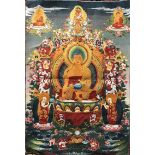 A Tibetan woven silk and gilt thread thangka of the seated Buddha, 61 x 89cm.