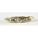 An 18ct yellow gold five diamond set ring, (N),