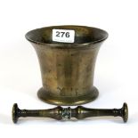 An 18th century bronze mortar and pestle, Dia. 14cm, H. 10cm.