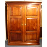 A high quality contemporary hardwood wardrobe, W. 163cm, H. 208cm.