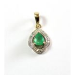 A 9ct yellow gold emerald and diamond set pendant.