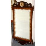 A Regency style carved and gilt wood mirror, H. 111cm