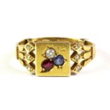 An antique 9ct yellow gold ring set with diamonds, sapphire and ruby, (N).