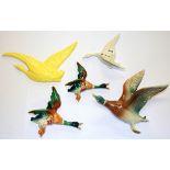 Five wall mounted flying bird figures, (two A/F).